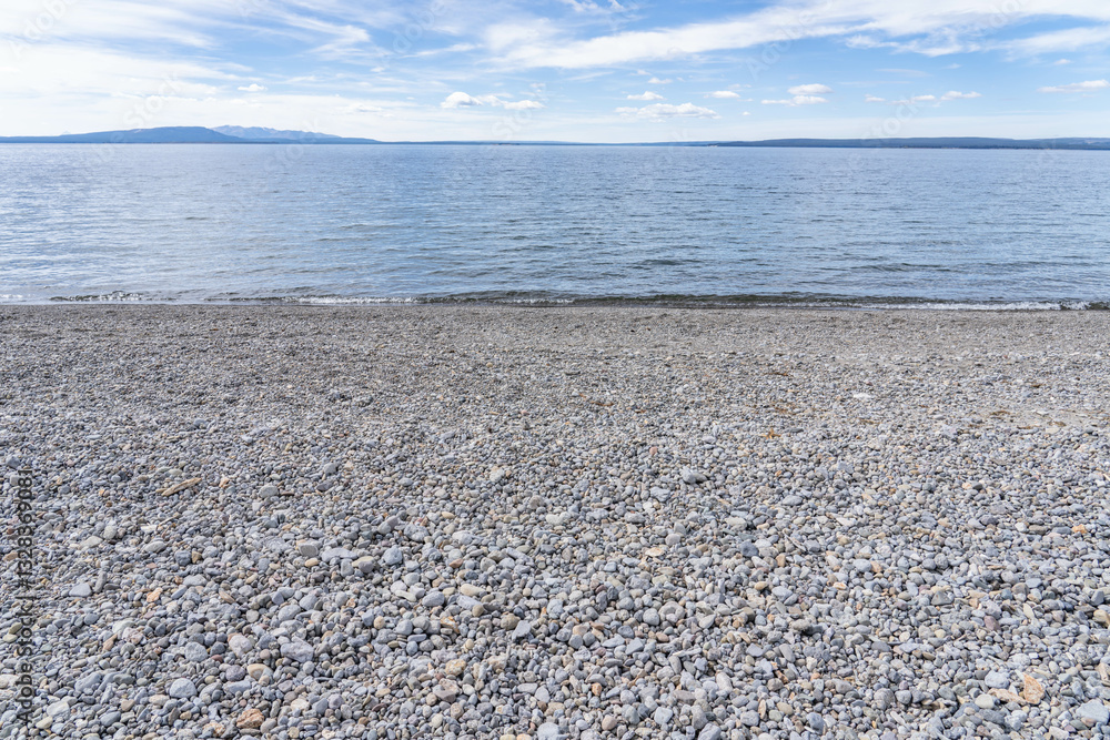 Obraz premium Lake sediments, Gray to brownish gray sandy gravel and gravelly. Sedge Bay, Yellowstone National Park in Wyoming. Yellowstone Lake