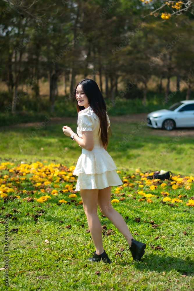 Fototapeta premium little girl walking in the park