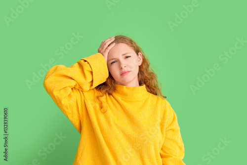 Stressed young woman on gre...