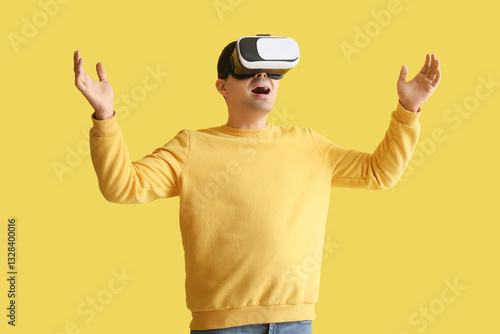 Happy young man using VR gl...