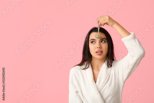 Beautiful young woman using...