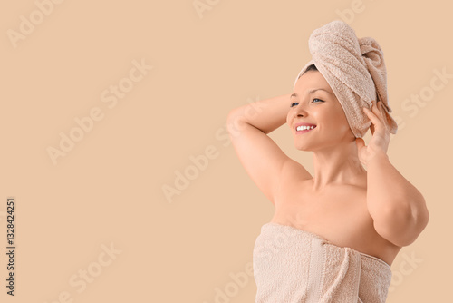 Young woman in towels after...