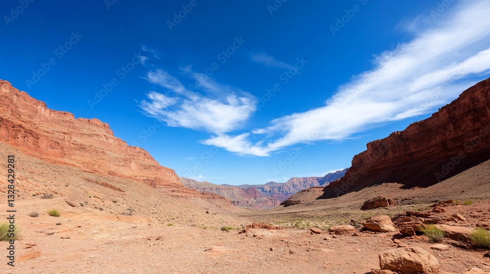 Red rock canyon landscape under a vibrant blue sky with clouds Red rock canyon landscape under a vibrant blue sky with clouds