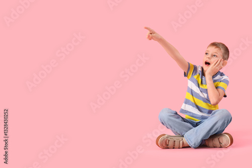 Shocked little boy pointing...