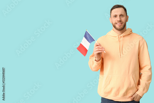 Young man with flag of Fran...