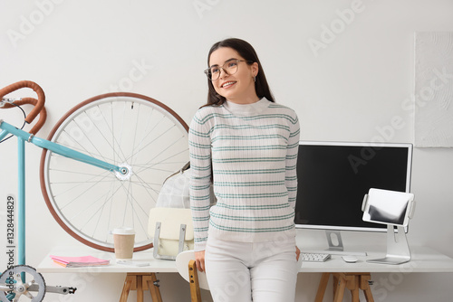 Female student near table a...