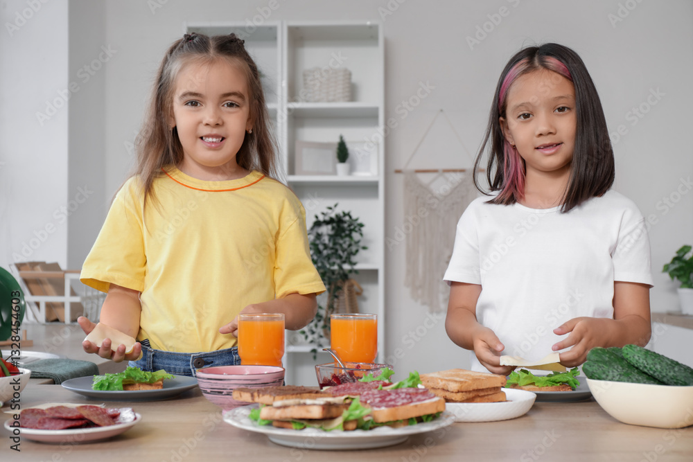 Little girls with cheese making toasts in kitchen Little girls with cheese making toasts in kitchen