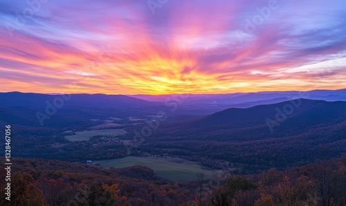 Stunning Sunrise Over Lush Valley and Rolling Mountains with Vibrant Colors in the Sky Illuminating the Scenic Landscape of Autumn