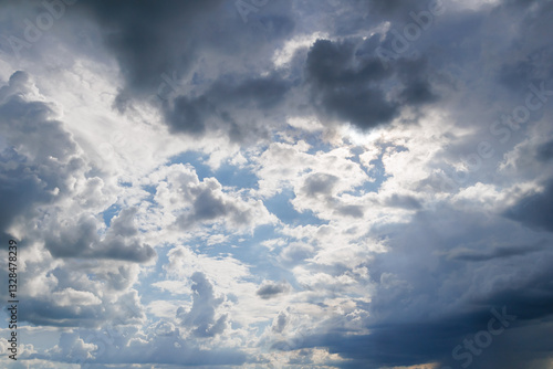 Dramatic sky with fluffy and dark clouds