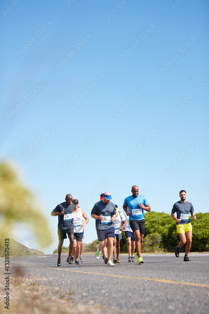 Fototapeta premium People, running tournament and outdoor marathon for fitness, cardio challenge and road for endurance. Athletes, mockup space and blue sky for workout in nature, international competition and sports
