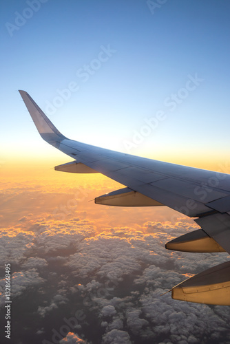 The airplane flew over the clouds.	