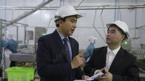 Asian business men at factory.Business, Factory Manufacturing, and Management, Inspection Technology and Safety