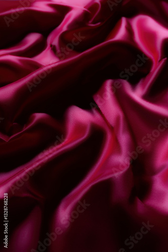 Luxurious silky fabric in deep magenta with elegant folds and soft lighting. Perfect for fashion design, textile backgrounds, branding, digital art, beauty aesthetics, romantic themes