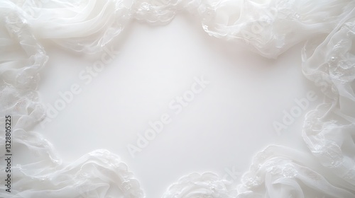 White lace and fabric borders a neutral light background
