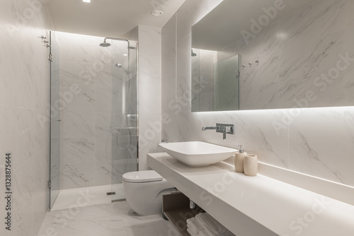 Wallpaper Mural Luxury bathroom with marble-effect walls, modern sink, and backlit mirror for a refined look Torontodigital.ca