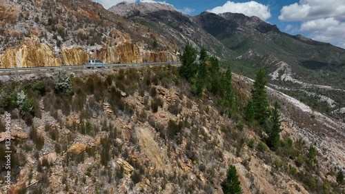 Queenstown_Tasmania-4K_50p_Drone_Mountains_Lift_Silver_Car_Passby