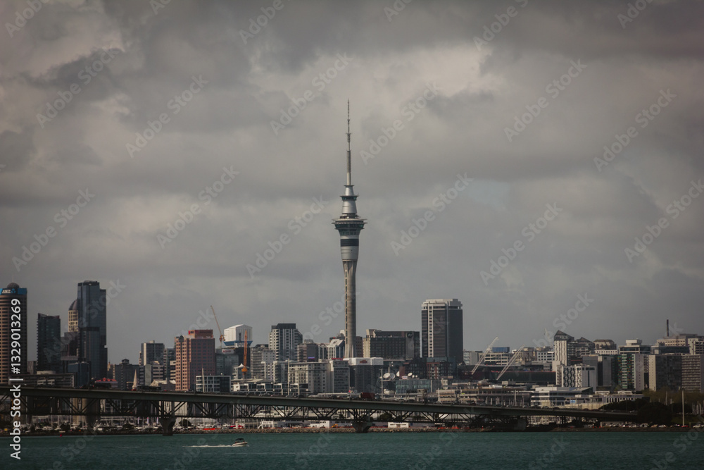 Obraz premium Retro style photo of a view over Auckland Harbour and a skyline of Auckland City from a suburb of Birkinhead. North Island, New Zealand