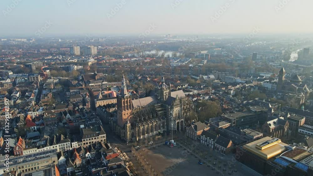 Beautiful aerial of the Sint-Janskathedraal Cathedral Church under renovation in 's-Hertogenbosch in the Netherlands on a sunny morning Beautiful aerial of the Sint-Janskathedraal Cathedral Church under renovation in 's-Hertogenbosch in the Netherlands on a sunny morning