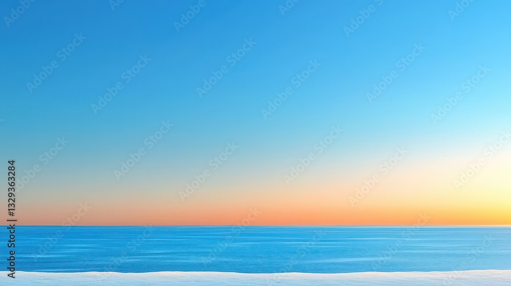 Obraz premium Serene ocean view at sunset with a clear blue sky