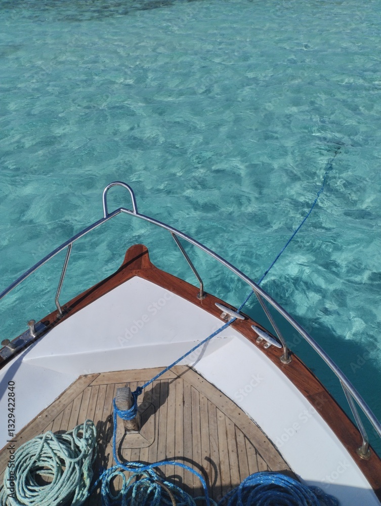 The bow of a boat, yacht, in the azure sea