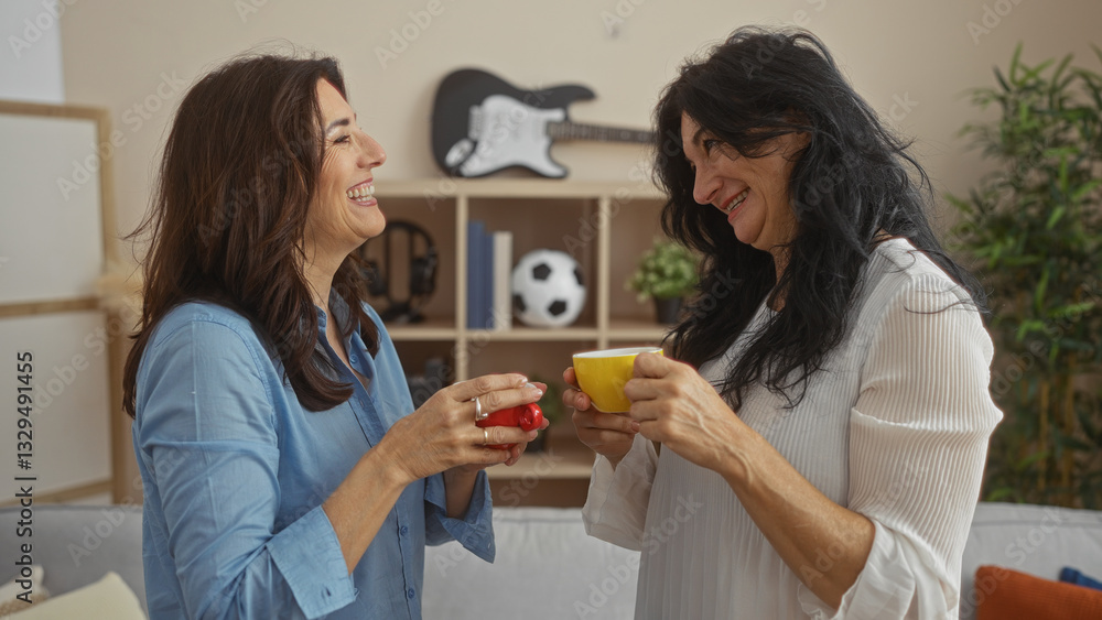 Women smiling while enjoying coffee together in a cozy living room, showcasing friendship and happiness. Women smiling while enjoying coffee together in a cozy living room, showcasing friendship and happiness.
