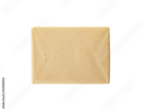 Obraz na płótnie A rectangular block of fresh, creamy butter with a smooth texture and a pale yellow hue, isolated on a white background. w salonie