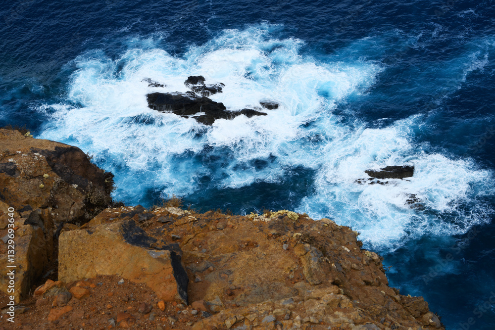 foamy water of the Atlantic Ocean under the cliffs of the Ponta de São Lourenço (Madeira, Portugal)