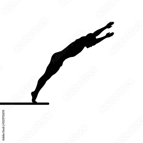 Silhouette of a springboard diver jumping into the water