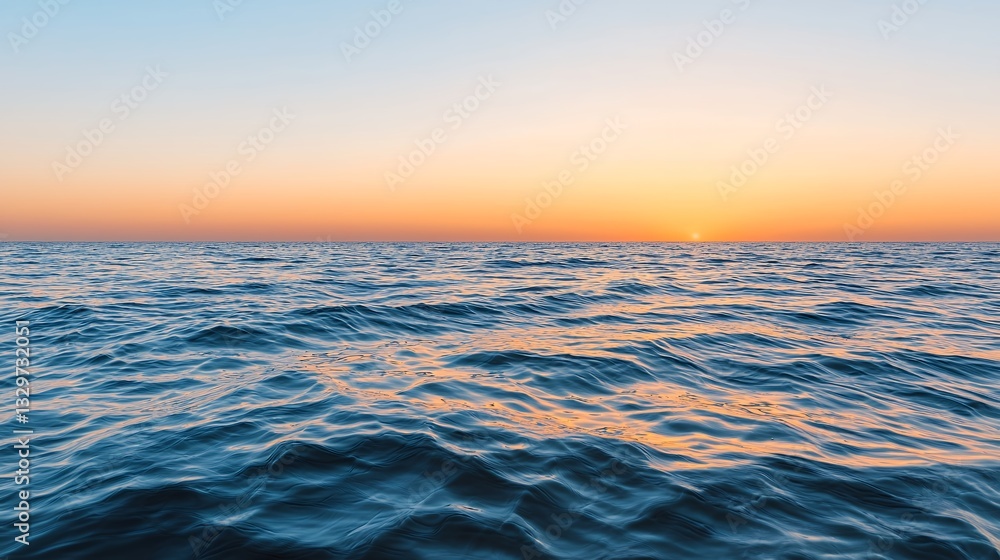 Fototapeta premium Peaceful Ocean Sunset Warm Hues and Calm Waves