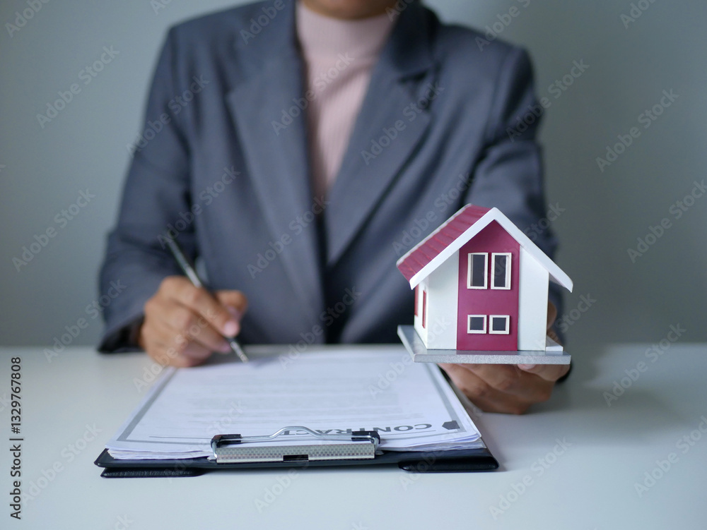 Fototapeta premium Real estate agent explains home rental and home insurance. Rent, Buy, Home Insurance, Home Insurance Concept