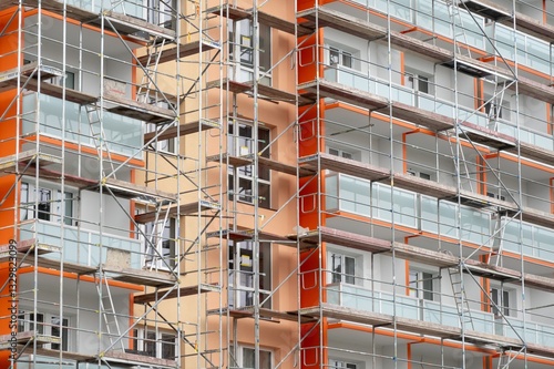 Construction of new balconies on old block of flats in Czech Republic, scaffolding