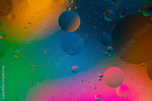 Closeup of bubbles in water from blue and red to yellow colors