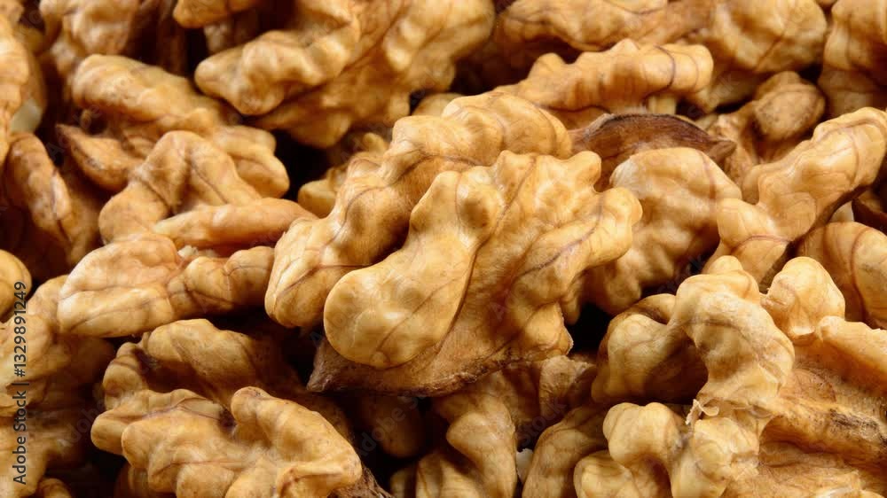 Walnut top view 4K video. Walnuts background. Walnut kernels top view macro video. Walnut top view 4K video. Walnuts background. Walnut kernels top view macro video.