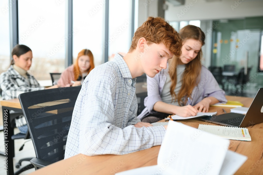 Fototapeta premium Students studying in library or classroom