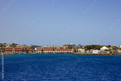 Wallpaper Mural Statue of a deer located at the entrance to Rhodes Mandraki harbor, the Church of the Annunciation also known as Evangelismos Church and the Governor’s Palace of Rhodes as seen from the water. Torontodigital.ca