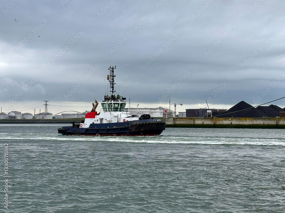 a tugboat, a small, powerful vessel used to maneuver larger ships, often assisting them with docking or navigating in confined waters. a tugboat, a small, powerful vessel used to maneuver larger ships, often assisting them with docking or navigating in confined waters.