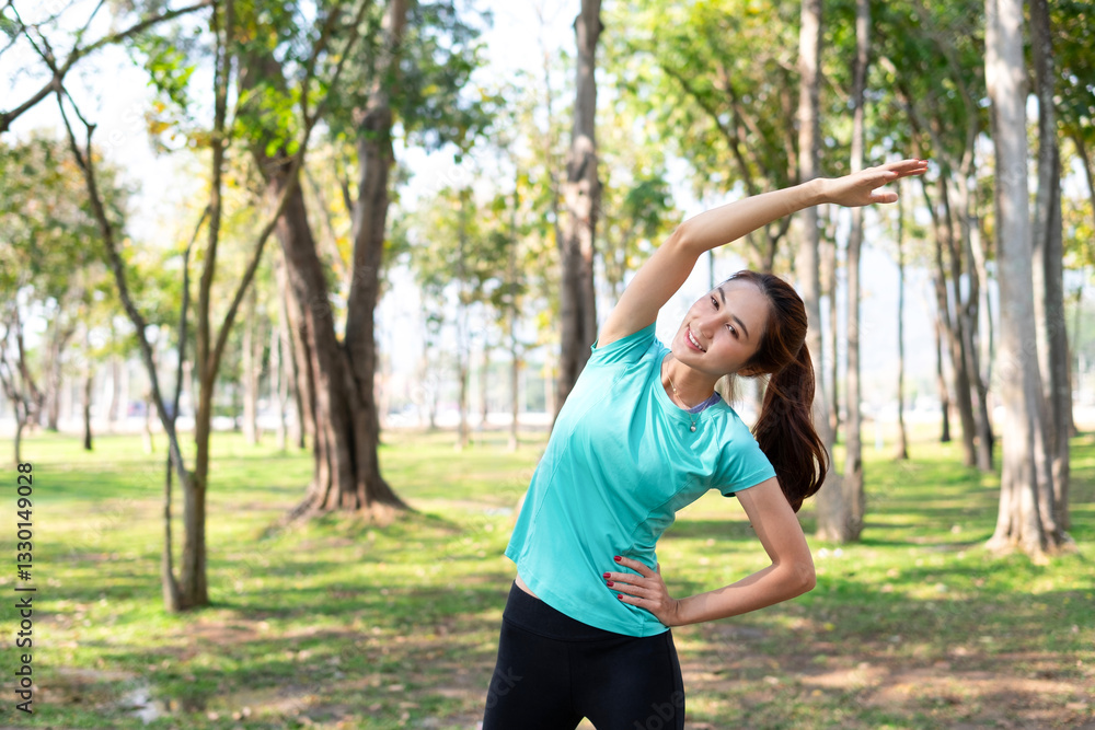 A woman stands and warms up before running. A woman stands and warms up before running.
