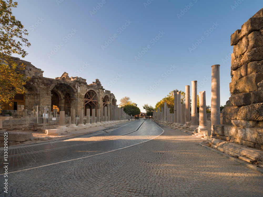 Obraz premium Ruins of the ancient city of Side. Stunned street of the amphitheatre. Morning light. Historical symbols of Antalya. 