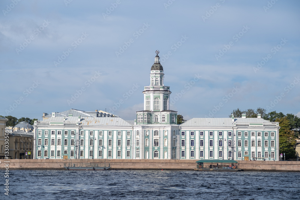 Stunning architecture along the Neva River in Saint Petersburg showcasing a historic building against a clear blue sky Stunning architecture along the Neva River in Saint Petersburg showcasing a historic building against a clear blue sky