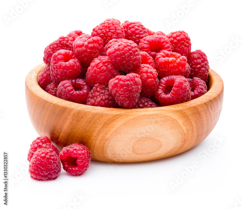 Ripe raspberries in wooden bowl isolated on white background
