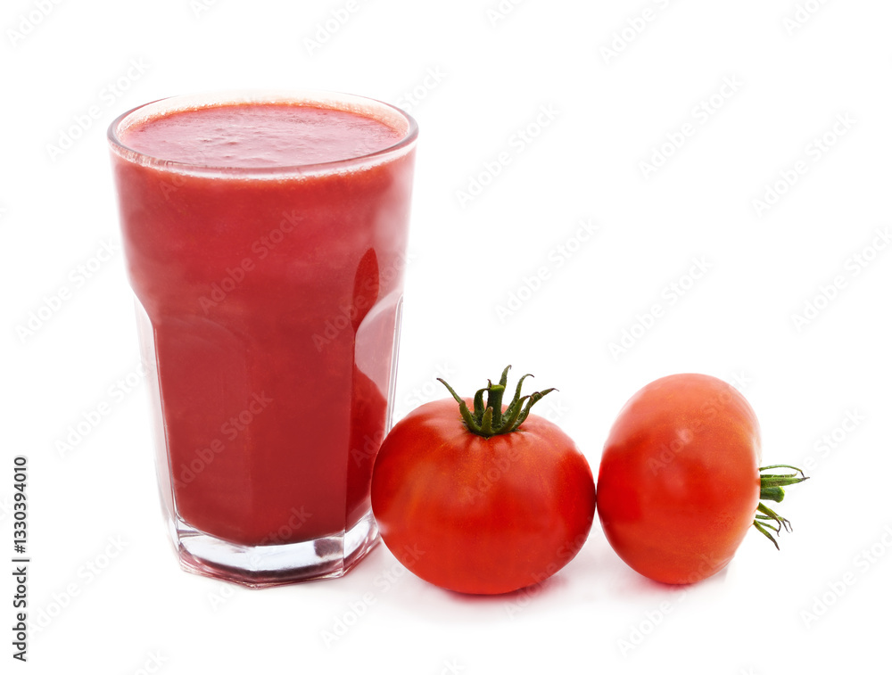 Glass of tomato juice and tomatoes. Glass of tomato juice and tomatoes.