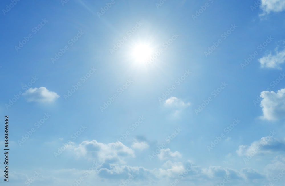 Fototapeta premium Blue sky with cumulus clouds with sunlight shining in a sunny day. Beautiful summer nature holiday. Freedom of life, New life beginning and Positive thought and energy concepts.
