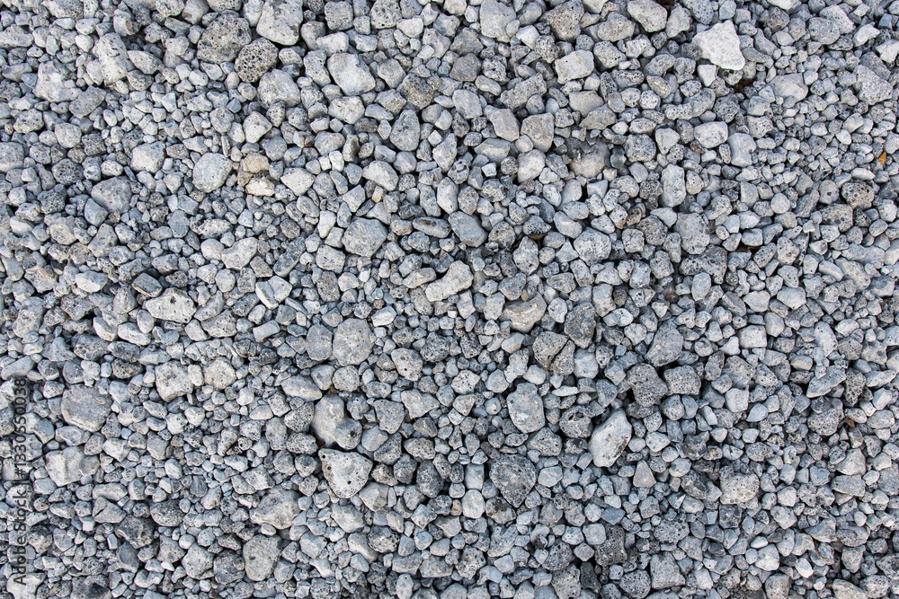 Texture of scattered gray gravel, ideal for construction, outdoor decor, and nature photography. Great for adding rugged charm to creative and design projects. Texture of scattered gray gravel, ideal for construction, outdoor decor, and nature photography. Great for adding rugged charm to creative and design projects.