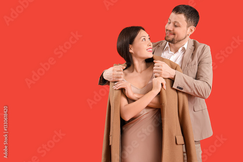 Young man covering his girl...