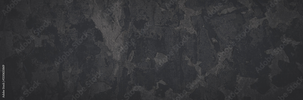 Dark wide panoramic background. Peeling paint on a concrete wall. Faded dark texture of old cracked flaking paint. Weathered rough painted surface with patterns of cracks. Shaded background for design