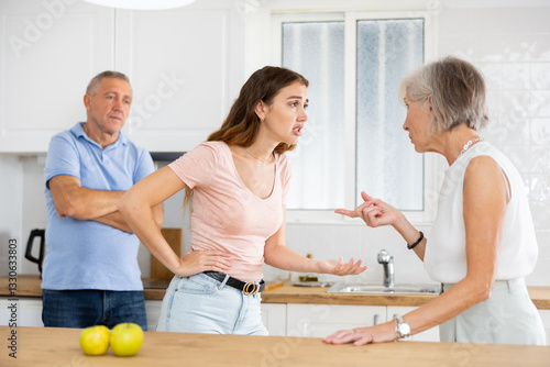 Vászonkép Mid aged mother scold grown up daughter