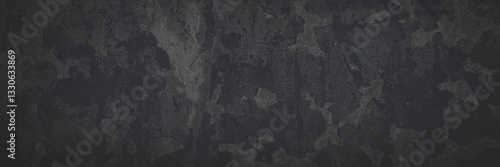 Obraz na płótnie Dark wide panoramic background. Peeling paint on a concrete wall. Faded dark texture of old cracked flaking paint. Weathered rough painted surface with patterns of cracks. Shaded background for design w salonie