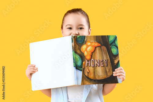 Cute little girl with book ...