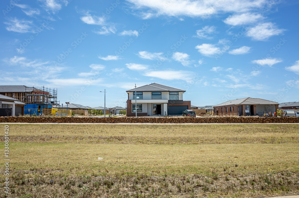 A new housing development in an outer suburb of Melbourne, Australia shows various stages of construction, with some completed homes alongside properties still being built. A new housing development in an outer suburb of Melbourne, Australia shows various stages of construction, with some completed homes alongside properties still being built.