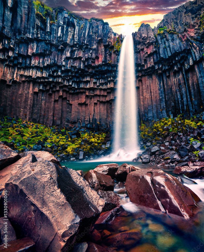 Dramatic morning view of famous Svartifoss (Black Fall) Waterfall.